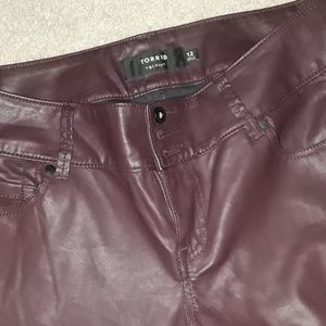 Burgundy leather look pants